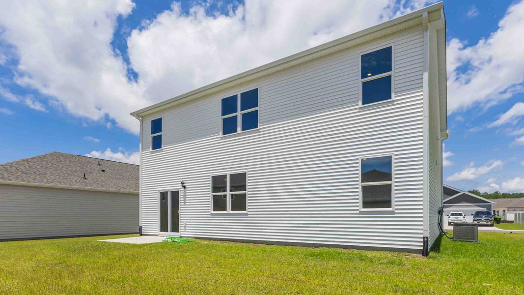 Representative exterior photo of a completed home built from the HAYDEN by D.R. Horton in Mariners Reach, Bolivia, NC (Image 20).