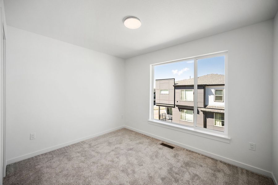 Spacious, unfurnished interior of a new home in Lyric at RidgeGate Townhomes, Lone Tree (Image 22). Spacious, unfurnished interior of a new home in Lyric at RidgeGate Townhomes, Lone Tree (Image 22).