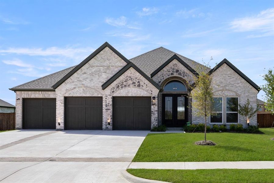 Front exterior of a new home in Shady Valley Estates, Midlothian, TX, highlighting curb appeal (Image 19). Front exterior of a new home in Shady Valley Estates, Midlothian, TX, highlighting curb appeal (Image 19).