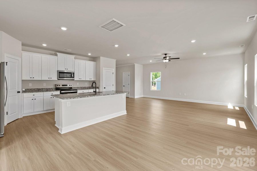 Furnished interior view inside a new home in Stagecoach Station, Gastonia (Image 6).