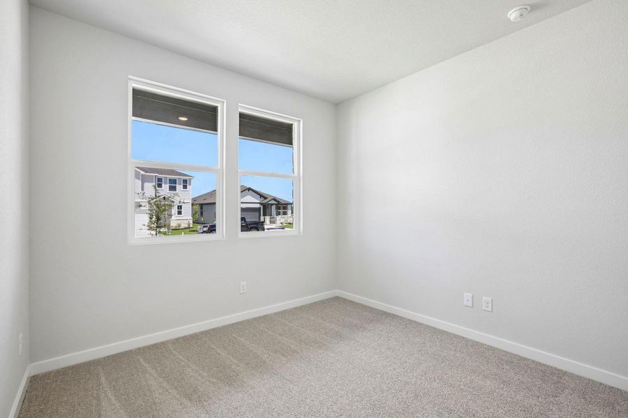 Spacious, unfurnished interior of a new home in Stallion Run, Buda (Image 35).