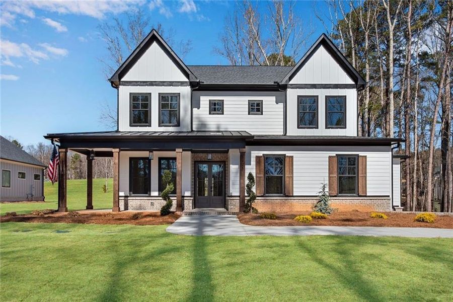 Front exterior of a new home in , Hiram, GA, highlighting curb appeal (Image 1). Front exterior of a new home in , Hiram, GA, highlighting curb appeal (Image 1).