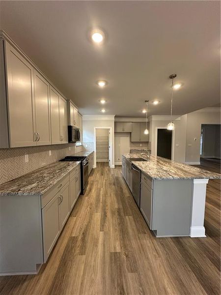 Furnished interior view inside a new home in Mirror Lake at South Harbour, Villa Rica (Image 5).