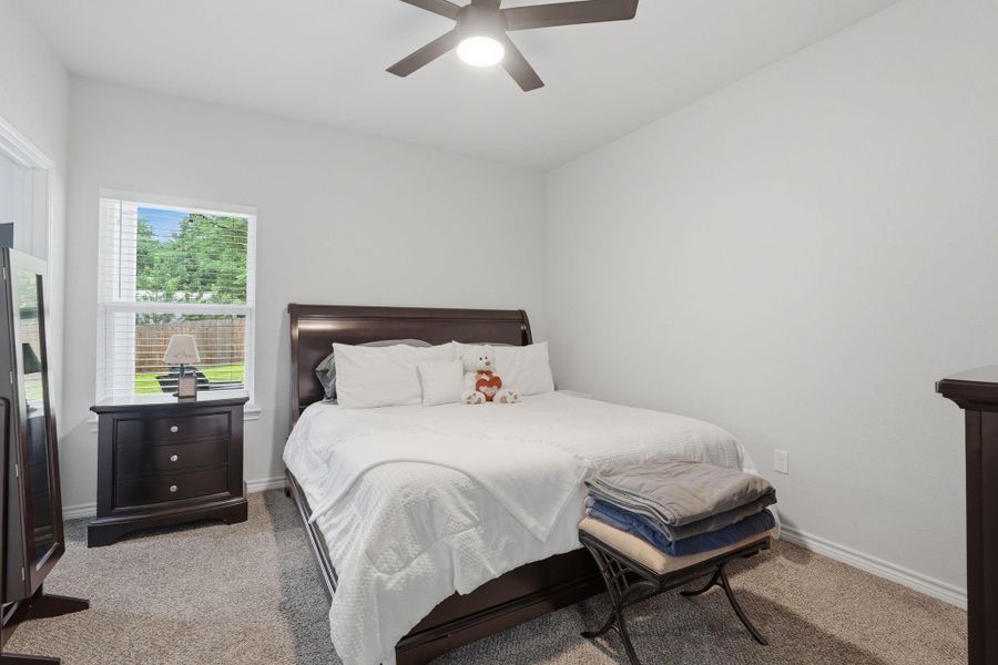 Furnished interior view inside a new home in Arrowhead Lakes, Willis (Image 28).