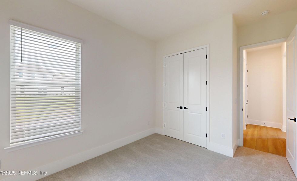 Spacious, unfurnished interior of a new home in Amelia National, Fernandina Beach (Image 8).