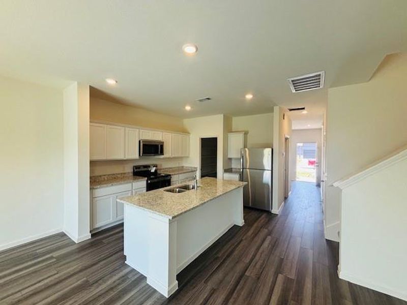 Furnished interior view inside a new home in Cedar Pointe, Crosby (Image 7).