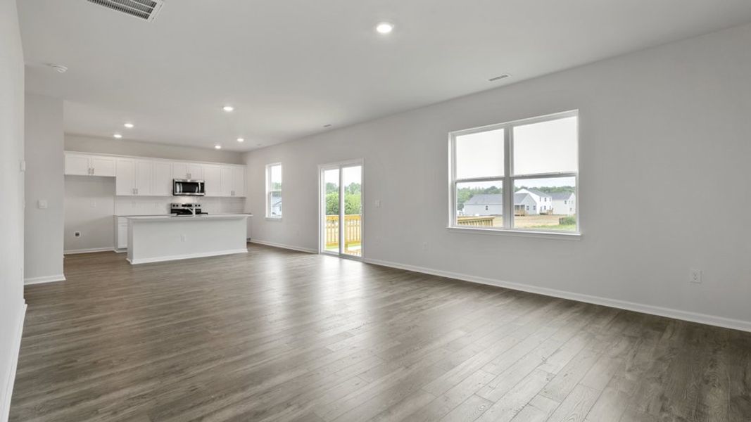 Spacious, unfurnished interior of a new home in Villa Grande, Winterville (Image 24).