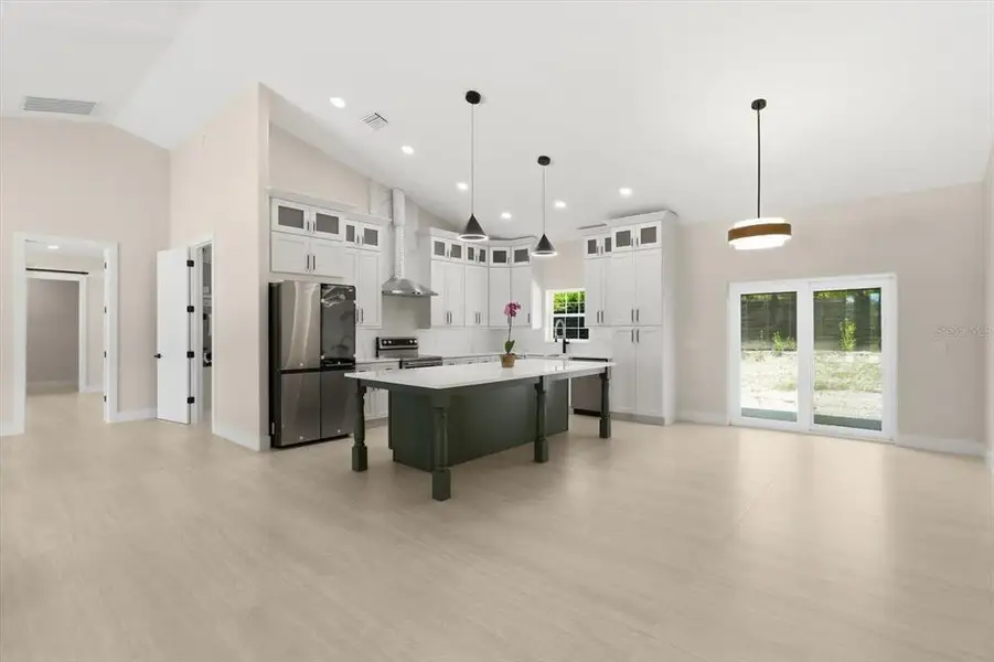 Furnished interior view inside a new home in , Dunnellon (Image 30).