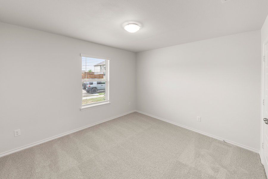 Representative exterior photo of a completed home built from the Cheyenne by Impression Homes in DeBerry Reserve, Royse City, TX (Image 13).