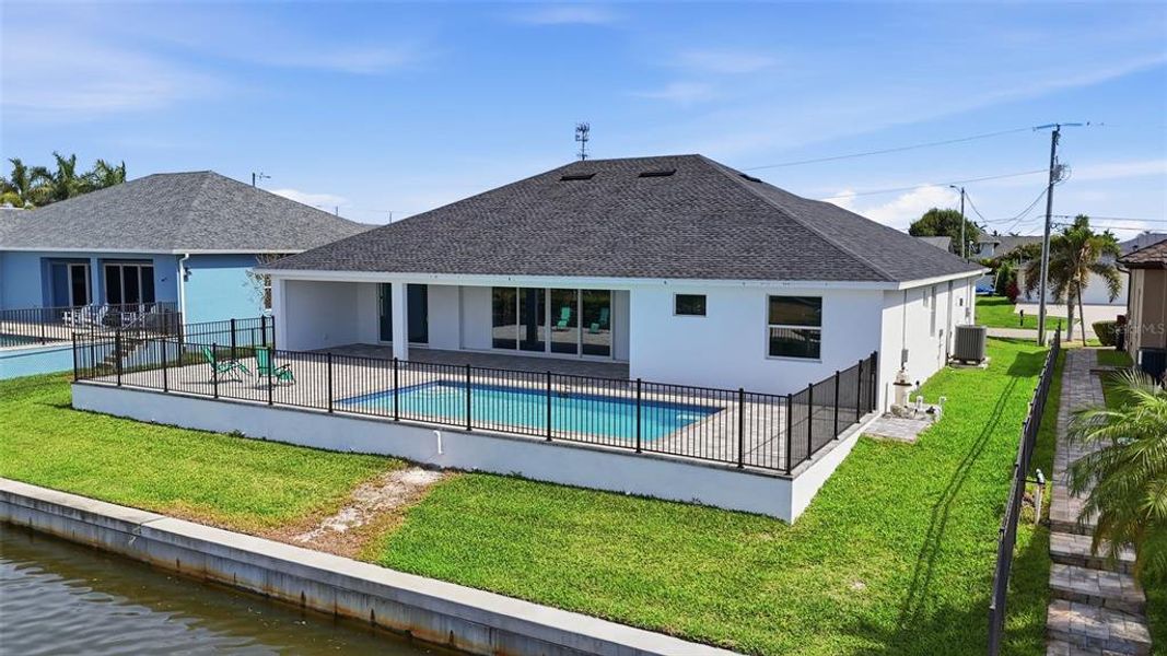 Exterior details and patio area of a home in , Cape Coral (Image 36).