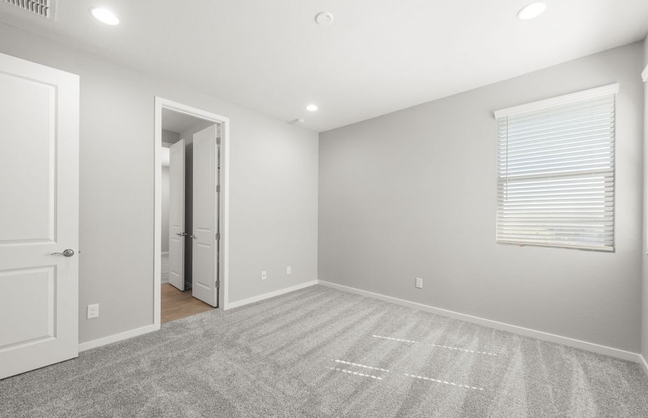Spacious, unfurnished interior of a new home in Harvest - Enchantment Series, Queen Creek (Image 31). Spacious, unfurnished interior of a new home in Harvest - Enchantment Series, Queen Creek (Image 31).