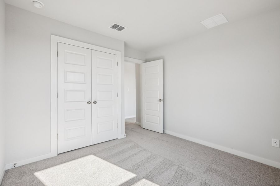 A room with white doors.