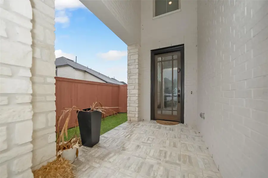 Exterior details and patio area of a home in Elyson, Katy (Image 3).