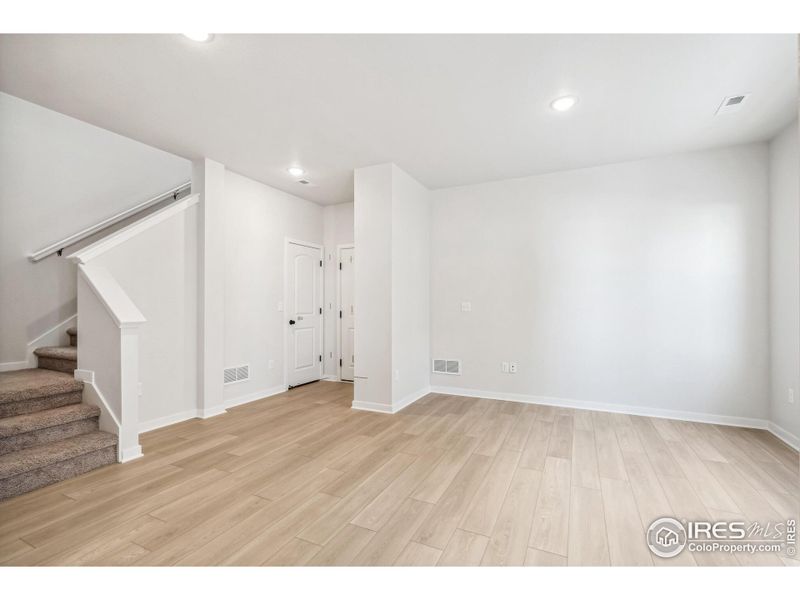 Spacious, unfurnished interior of a new home in Kinston Mainstreet Townhomes, Loveland (Image 28).