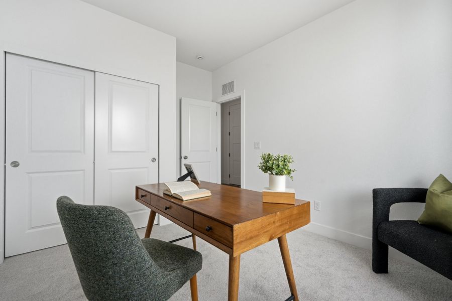 Furnished interior view inside a new home in Trailstone, Arvada (Image 16).