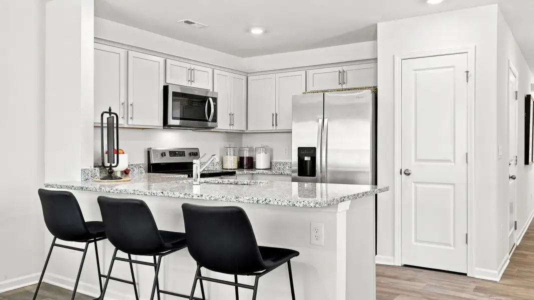 Furnished interior view inside a new home in The Townes at Hunter Hill, Rocky Mount (Image 10). Furnished interior view inside a new home in The Townes at Hunter Hill, Rocky Mount (Image 10).