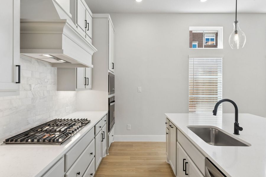 Furnished interior view inside a new home in Newman Village Townhomes, Frisco (Image 5).