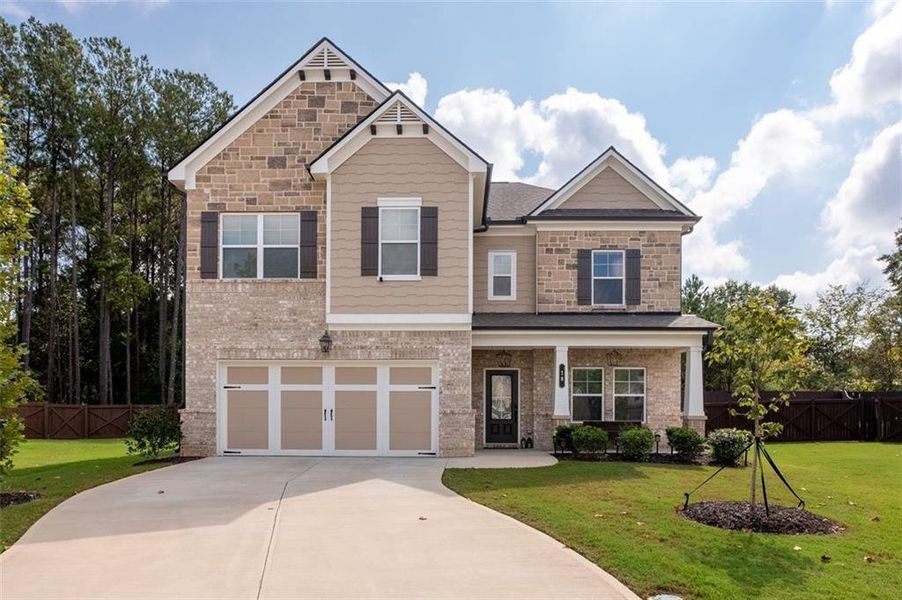 Front exterior of a new home in , Lawrenceville, GA, highlighting curb appeal (Image 21).