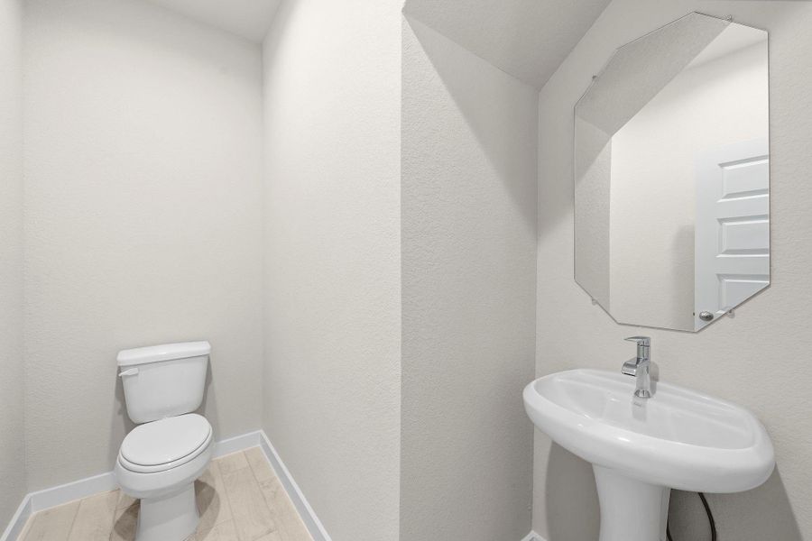 Furnished interior view inside a new home in Barton Creek Ranch, Conroe (Image 5).