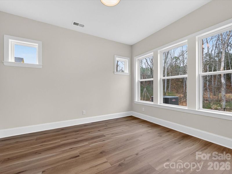 Spacious, unfurnished interior of a new home in North Creek Village, Huntersville (Image 33).