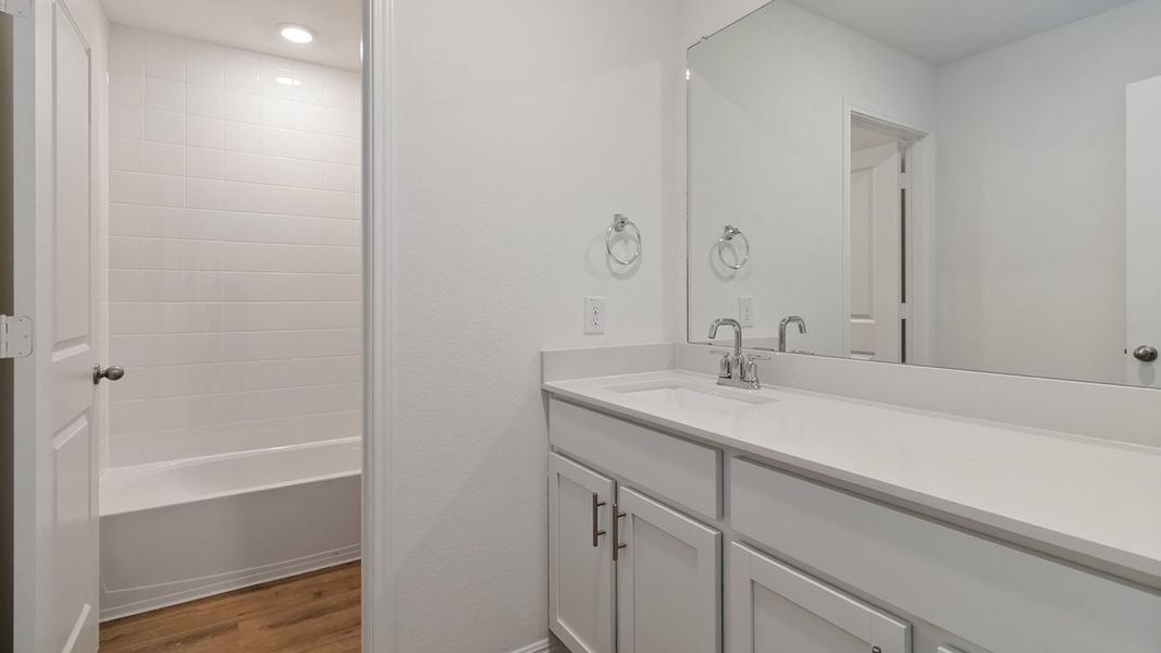 Representative furnished interior of a home built from the The Rosemont by D.R. Horton in Bar W Ranch, Leander (Image 9).