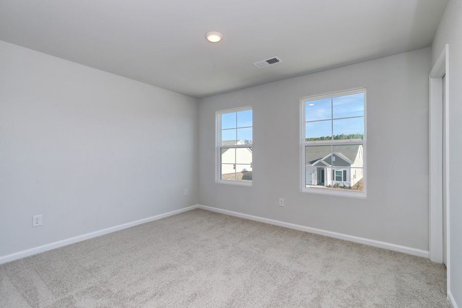 Spacious, unfurnished interior of a new home in Hainer Place, Conway (Image 36).