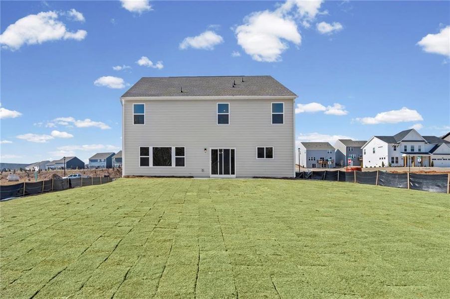 Exterior details and patio area of a home in Twin Lakes, Hoschton (Image 27).