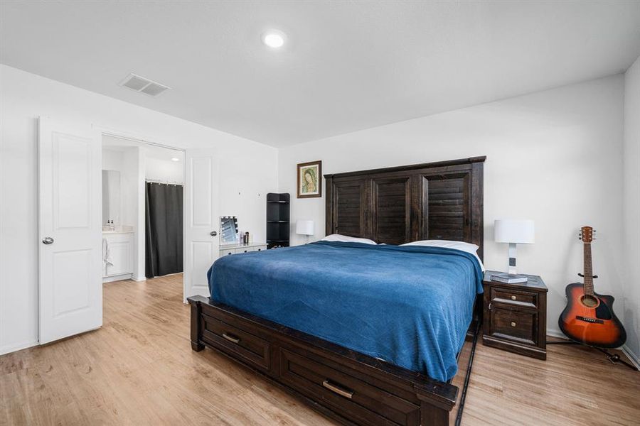 Primary bedroom with the primary bathroom view