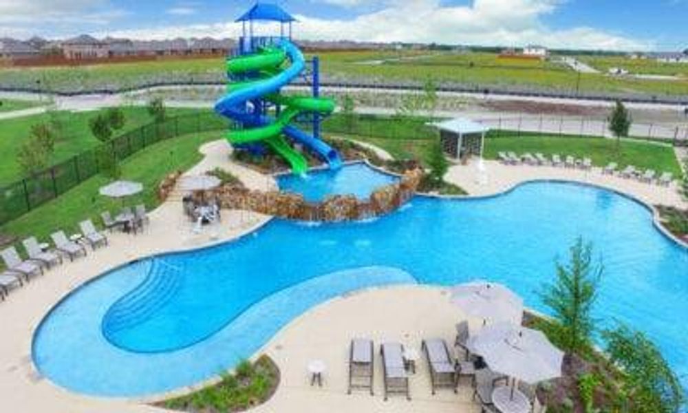 View of swimming pool featuring a water slide