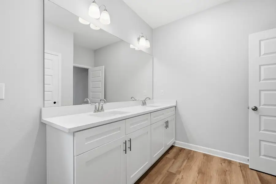 Furnished interior view inside a new home in Live Oak Cottages, Freeport (Image 13).