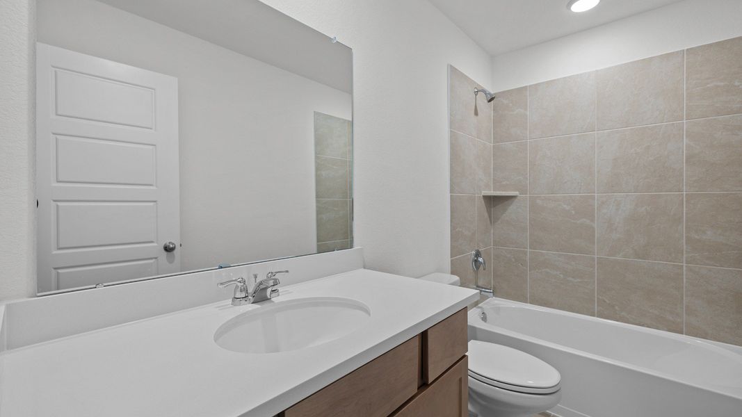 Furnished interior view inside a new home in Oakwood Estates, Waller (Image 9).