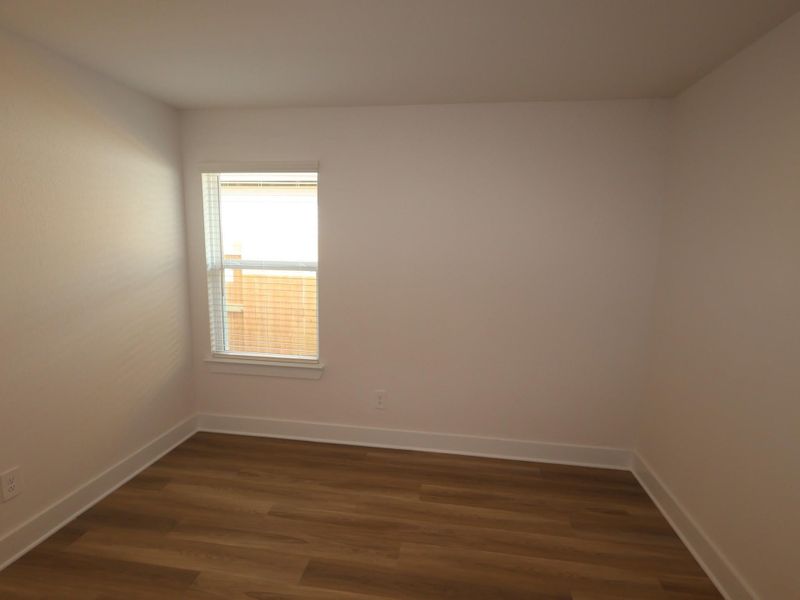 Spacious, unfurnished interior of a new home in Lone Star Landing, Montgomery (Image 35).