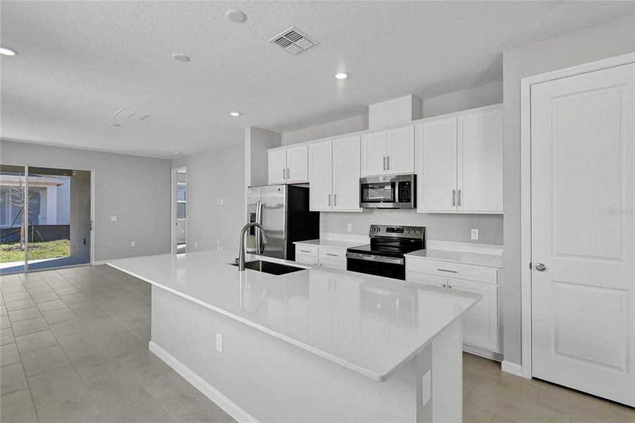 Furnished interior view inside a new home in Seasons at Magnolia Pointe, Umatilla (Image 7).