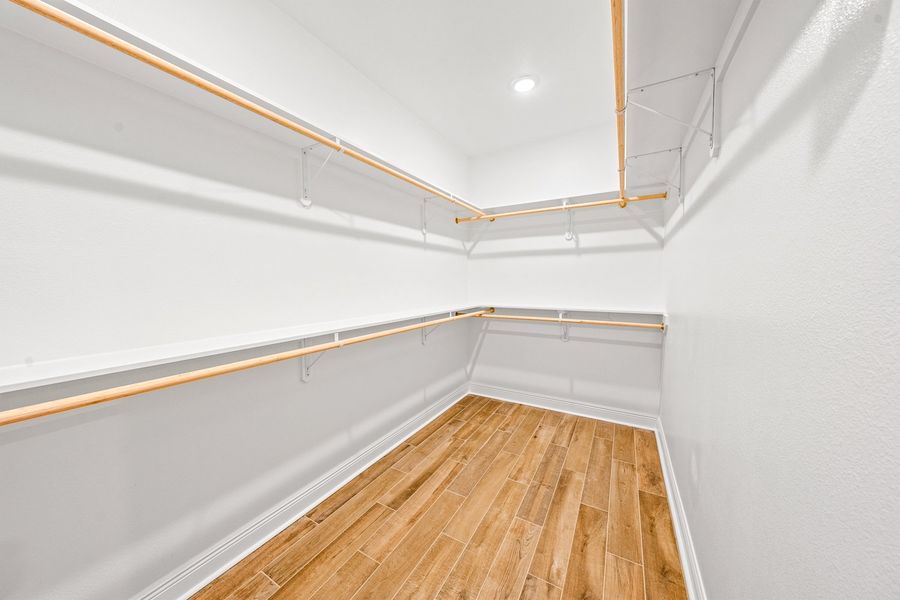 Spacious, unfurnished interior of a new home in Bird Song at Hammock Bay, Freeport (Image 21).