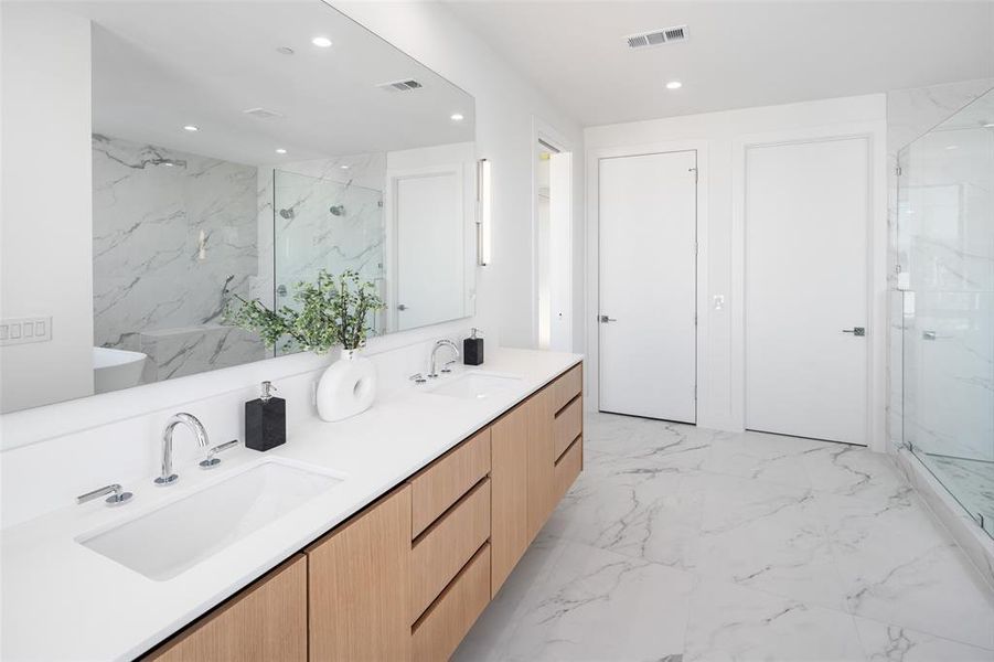 Bathroom with vanity and walk in shower