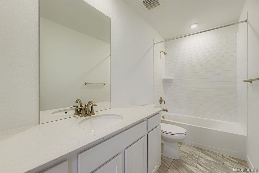 Furnished interior view inside a new home in Vermilion Creek: The Pioneer Collection, Centennial (Image 3).