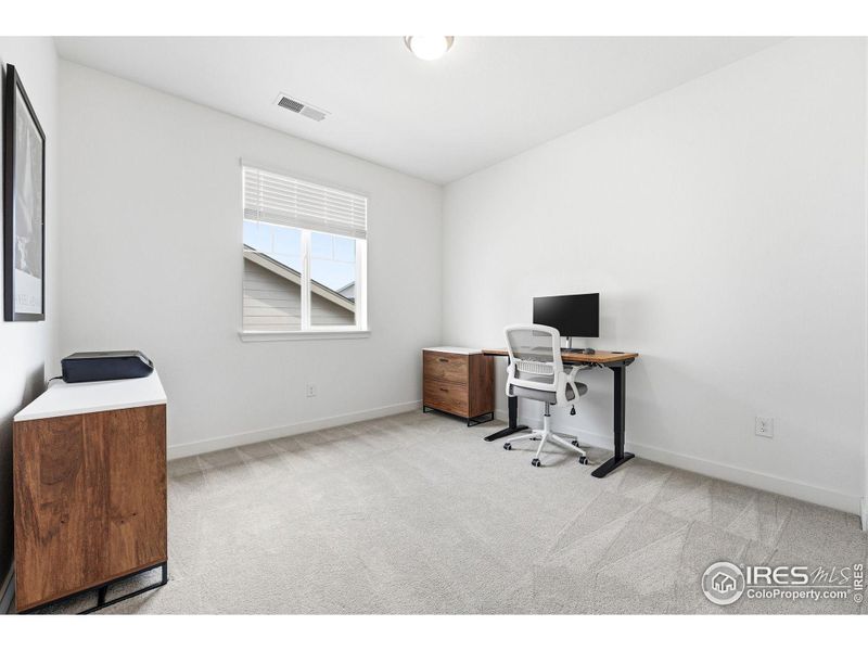 Additional bedroom (bedroom 5) or office or flex space - with great natural light