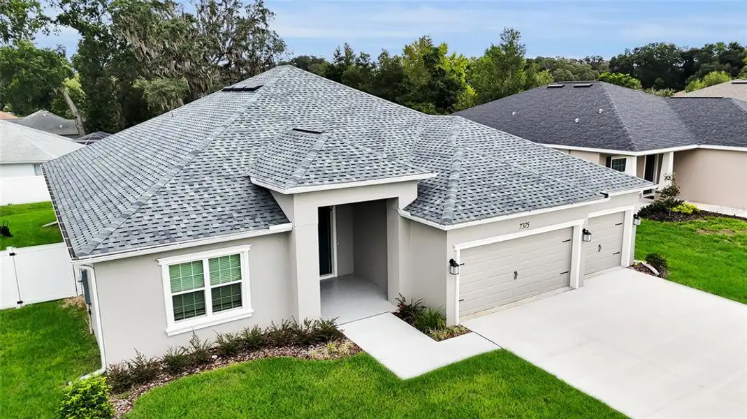 Front exterior of a new home in , Ocala, FL, highlighting curb appeal (Image 30).