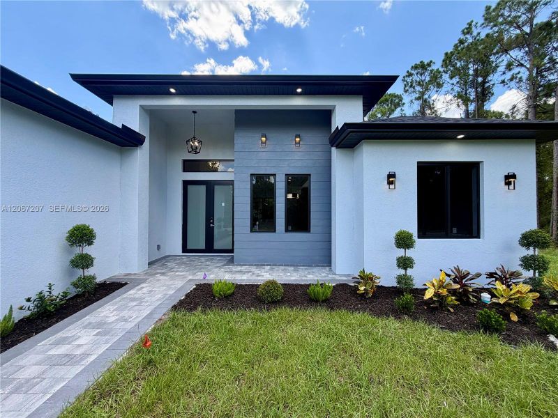 Exterior details and patio area of a home in , Lehigh Acres (Image 3). Exterior details and patio area of a home in , Lehigh Acres (Image 3).