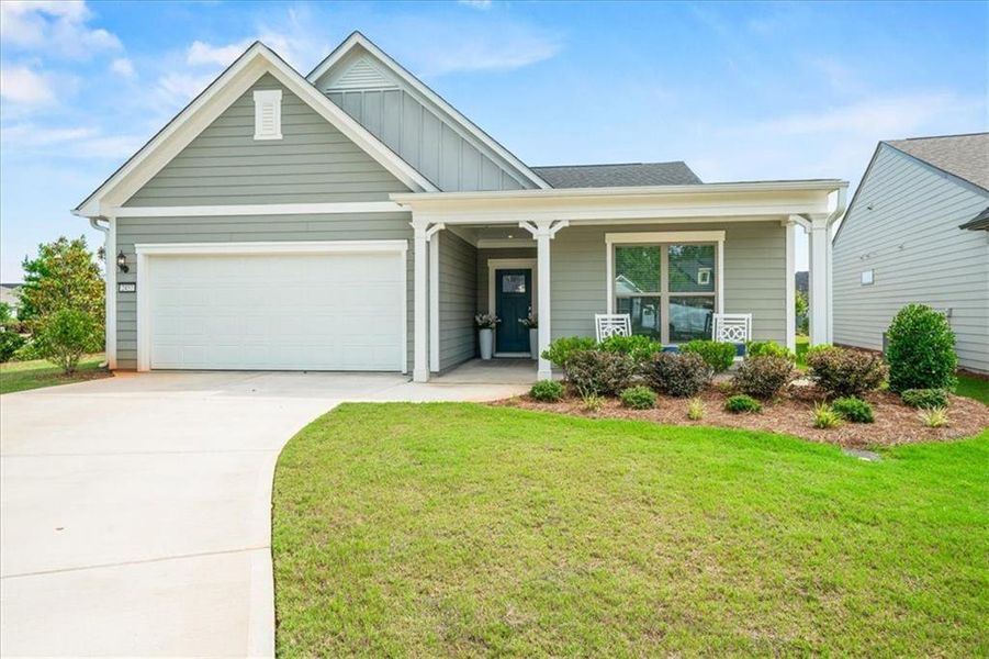 Front exterior of a new home in , Hoschton, GA, highlighting curb appeal (Image 1). Front exterior of a new home in , Hoschton, GA, highlighting curb appeal (Image 1).
