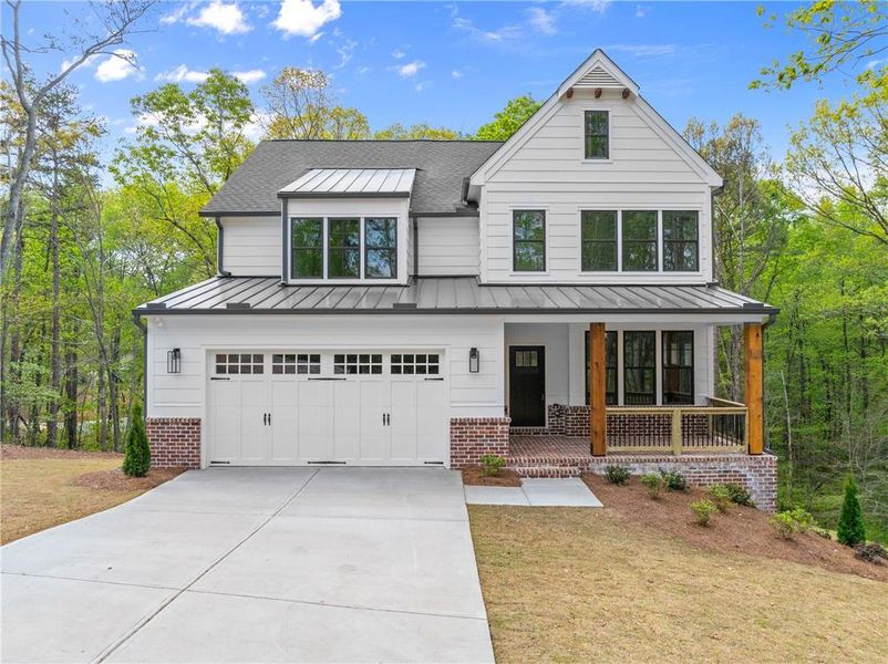 Front exterior of a new home in , Dawsonville, GA, highlighting curb appeal (Image 20). Front exterior of a new home in , Dawsonville, GA, highlighting curb appeal (Image 20).