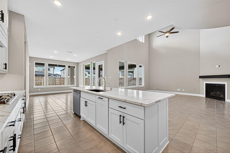 Open concept floor plan connecting the kitchen, dining area, and living area.