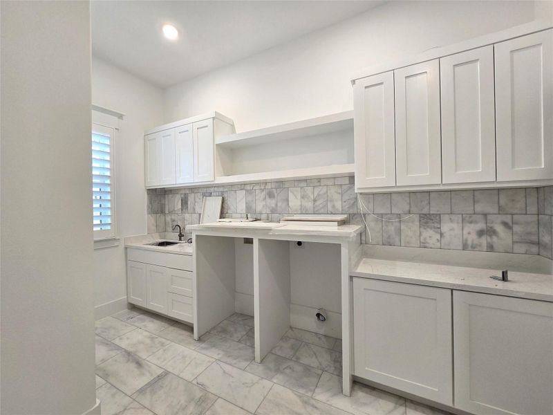 Laundry on level 1 connects to primary closet