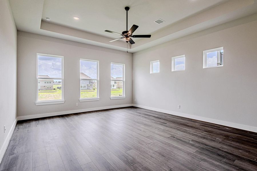 Spacious primary suite with abundant natural light Spacious primary suite with abundant natural light