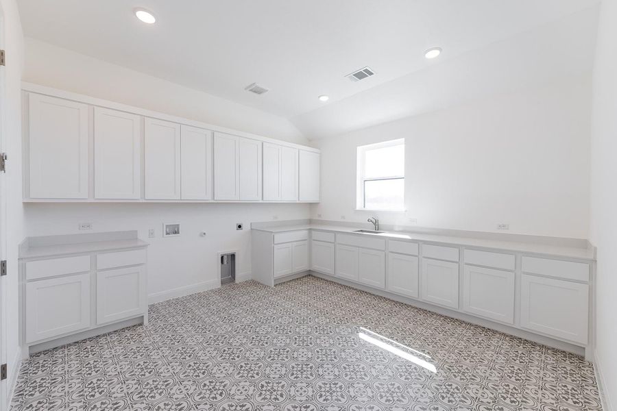 Furnished interior view inside a new home in Lariat - 70', Liberty Hill (Image 12).