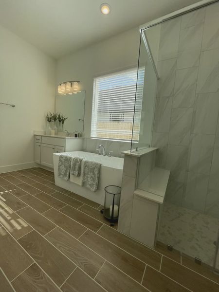 Representative furnished interior of a home built from the Mickelson by Chesmar Homes in Riceland Alley Loads, Mont Belvieu (Image 56).