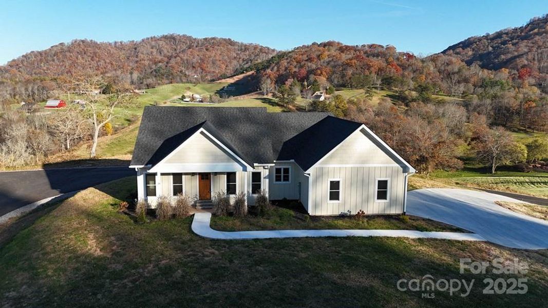 Front exterior of a new home in , Clyde, NC, highlighting curb appeal (Image 1).