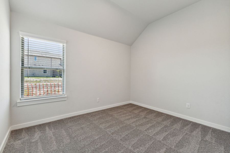 Bedroom in the Amber home plan by Trophy Signature Homes – REPRESENTATIVE PHOTO Bedroom in the Amber home plan by Trophy Signature Homes – REPRESENTATIVE PHOTO
