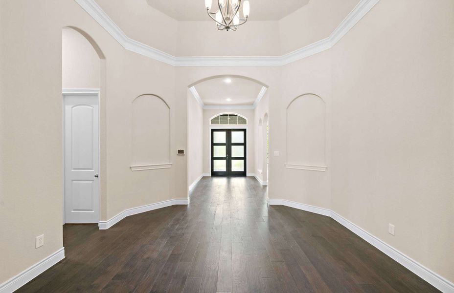 Representative unfurnished interior of a home built from the 4082 by Ravenna Homes in Artavia 70′, Conroe (Image 21).