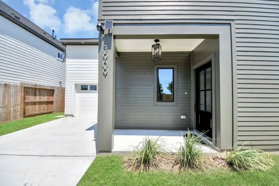 Exterior details and patio area of a home in , Houston (Image 3). Exterior details and patio area of a home in , Houston (Image 3).